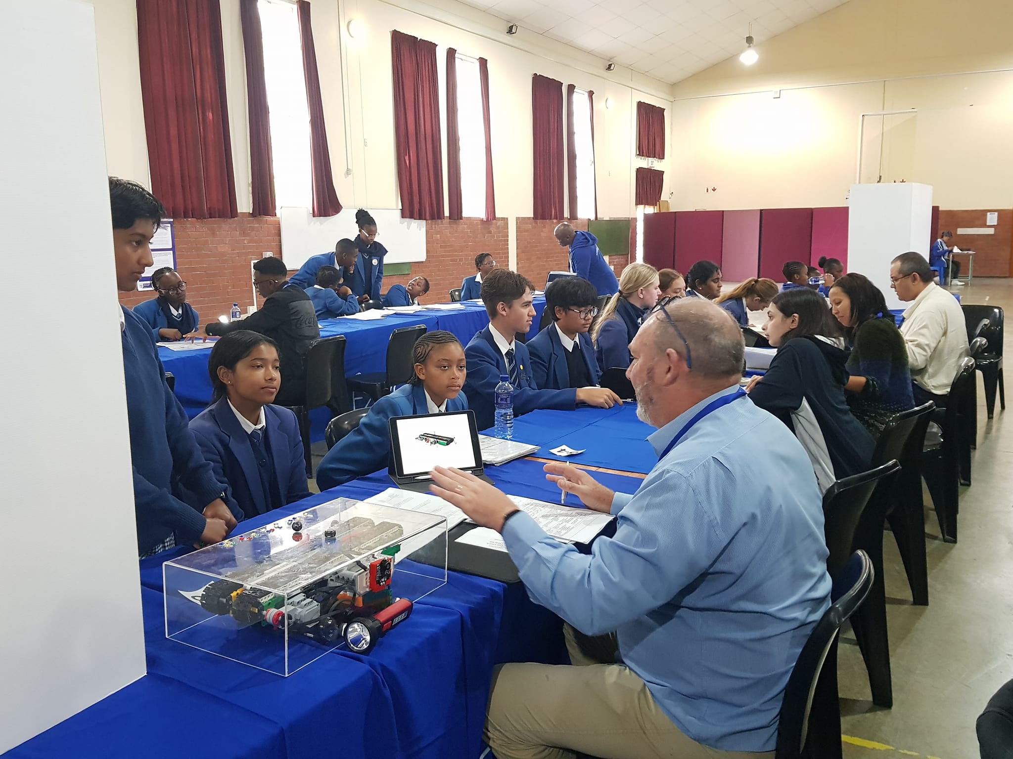 Judges evaluating science projects